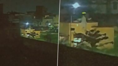 Real Ghost Caught on Camera in Varanasi? Viral Video of Spooky Figure Climbing on House Roof Will Make Your Blood Run Cold 